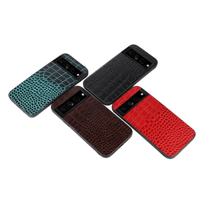 Crocodile-texture leather phone cases set in teal, brown, red, and black