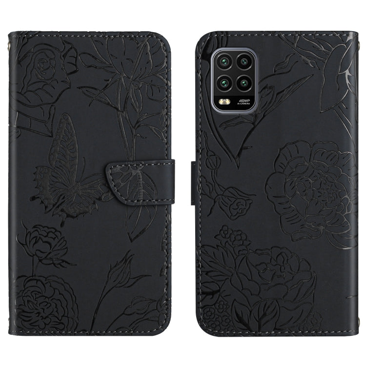 Black flip phone case with embossed butterfly and peony floral pattern, front flap