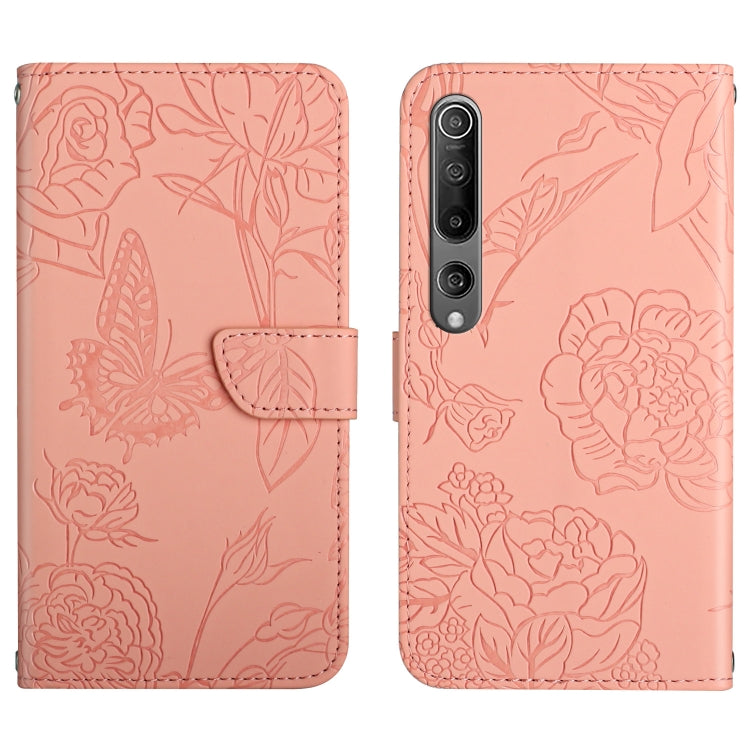 Pink flip phone case with embossed butterfly and peony floral pattern, front flap