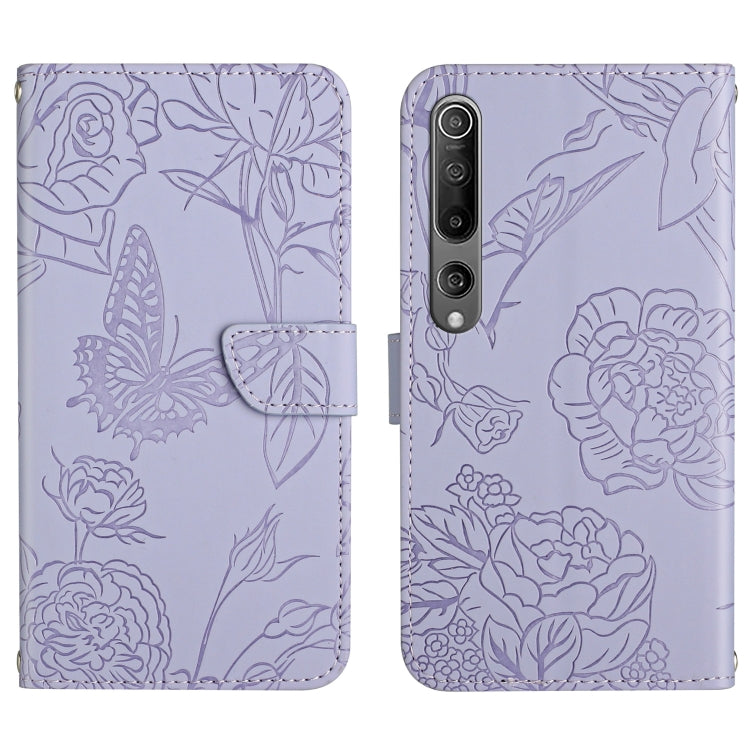 Purple flip phone case with embossed butterfly and peony floral pattern, front flap