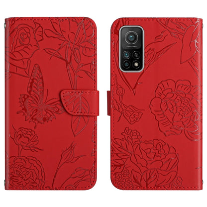Red flip phone case with embossed butterfly and peony floral pattern, camera cutouts