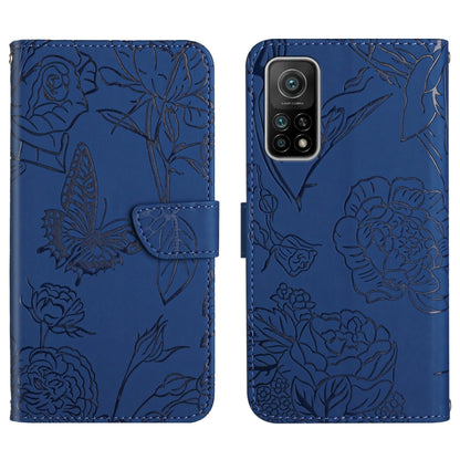 Blue flip phone case with embossed butterfly and peony floral pattern, camera cutouts