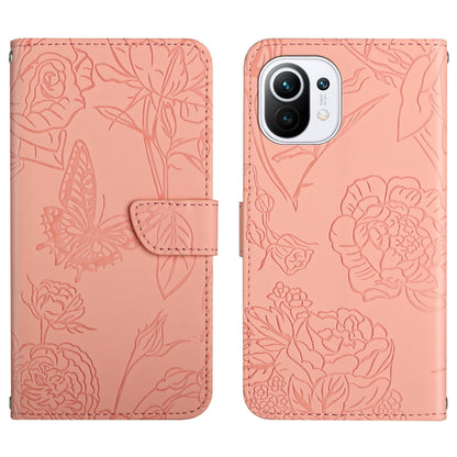 Pink wallet-style embossed leather phone case with butterfly and peony floral pattern