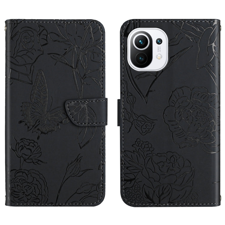 Black embossed leather phone case with butterfly and peony design and side magnetic strap