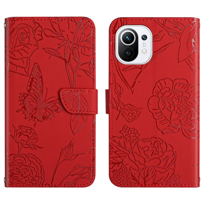 Red embossed leather phone case with butterfly and peony design and card-slot flap