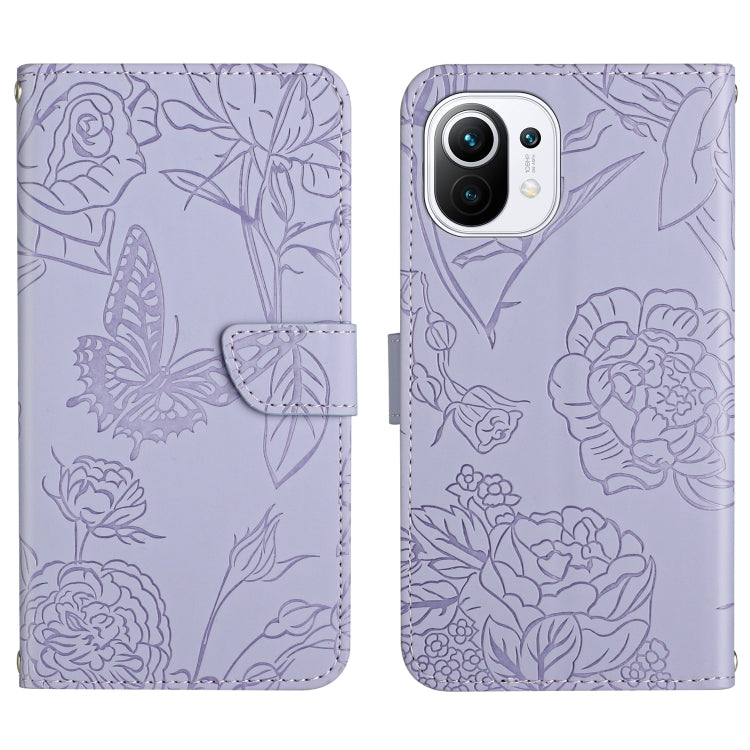 Purple embossed leather phone case with butterfly and peony design and magnetic closure