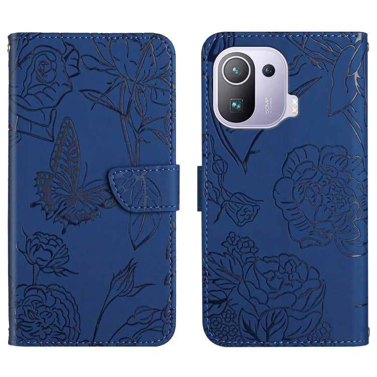 Blue embossed leather-style folio phone case with butterfly and peony pattern, flap and pocket