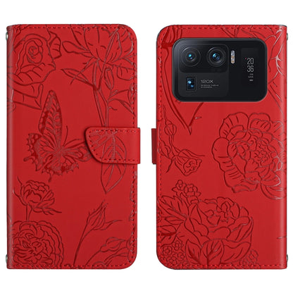 Red embossed leather-style folio phone case with butterfly and peony pattern and camera cutout