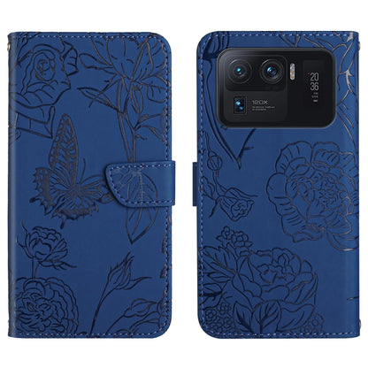 Blue embossed leather-style folio phone case with butterfly and peony pattern and camera cutout