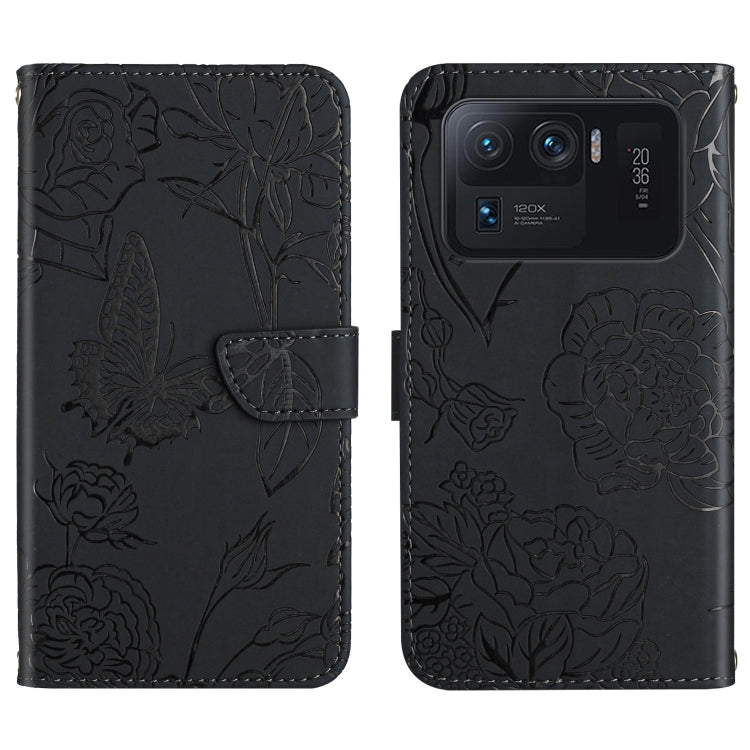 Black embossed floral/butterfly folio phone case with front flap and card slot