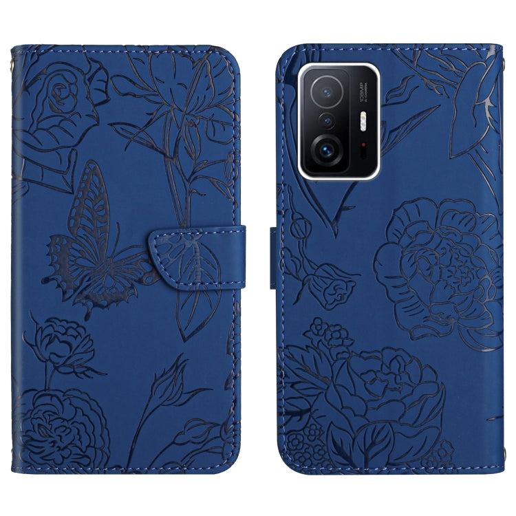 Blue embossed floral/butterfly folio phone case with front flap and card slot
