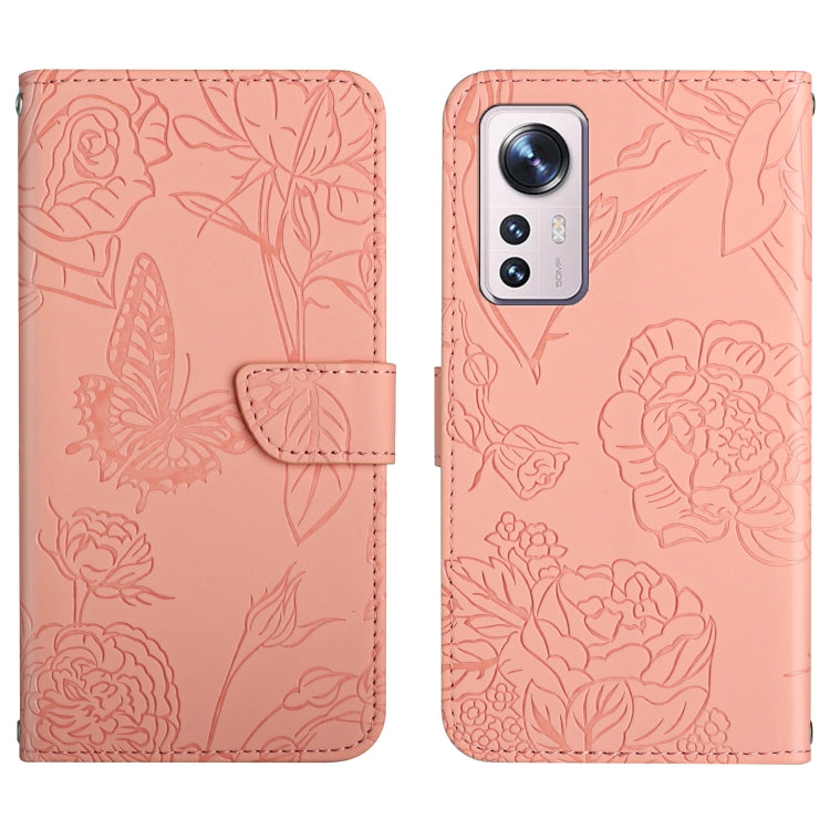 Pink embossed floral/butterfly folio phone case with camera cutout