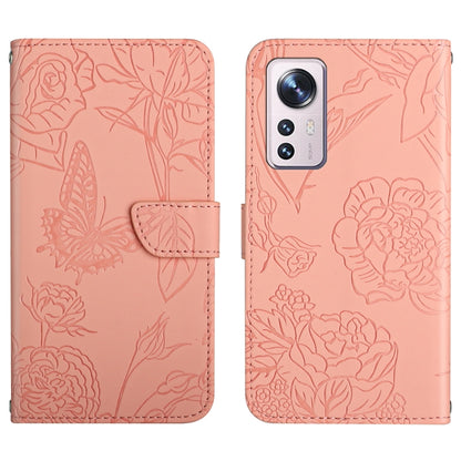 Pink embossed floral/butterfly folio phone case with camera cutout