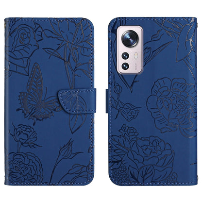 Blue embossed floral/butterfly folio phone case with camera cutout