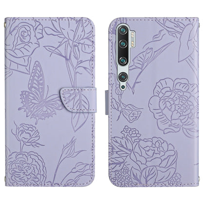 Lavender embossed leather folio phone case with butterfly peony floral pattern and flip strap.