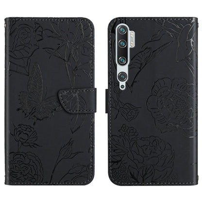 Black embossed leather folio phone case with floral butterfly relief and camera cutouts.
