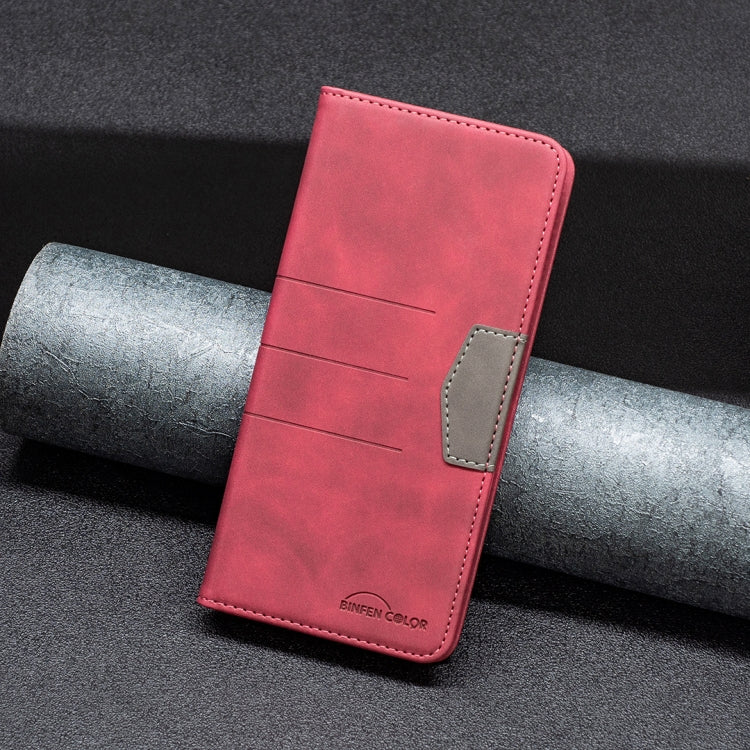 Red leather phone wallet case with stitched side pocket and secure flip closure.