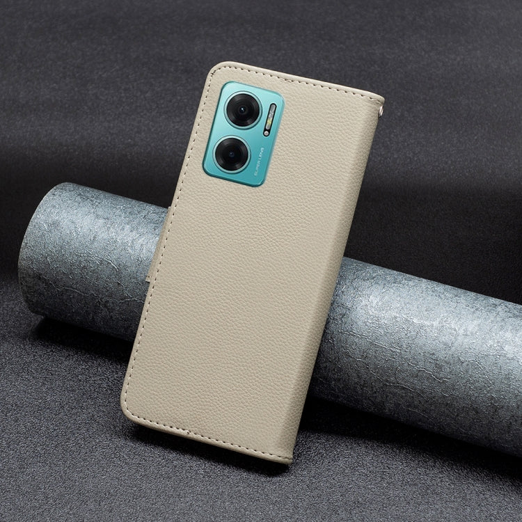 Light grey litchi-texture leather phone case with camera cutouts and side strap