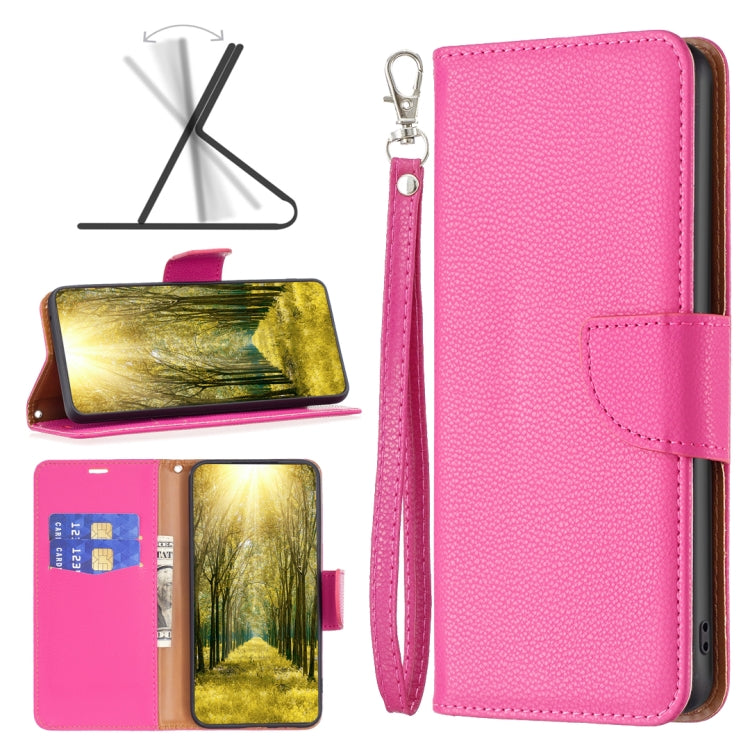 Pink leather wallet phone case with flip cover, wrist strap, and card slot pocket.