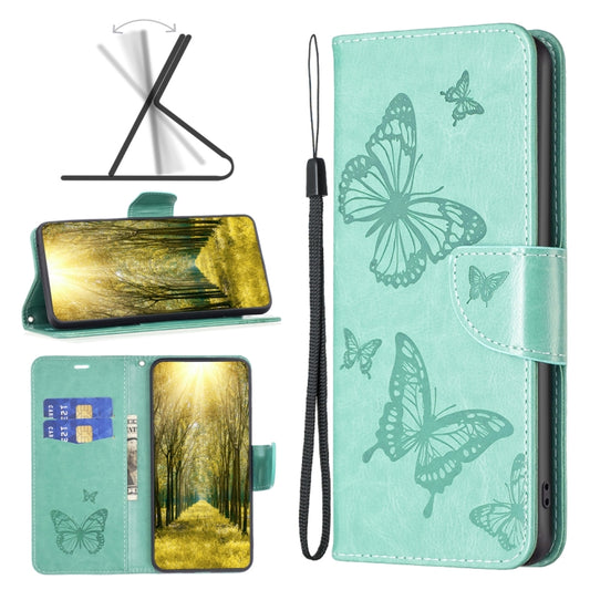 Mint green leather phone case with two-butterfly embossed pattern and wrist strap