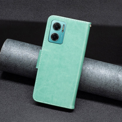 Mint green leather phone case with butterfly embossing and dual camera opening