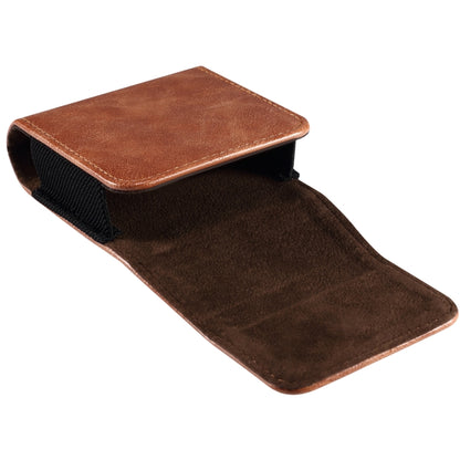 Brown leather folding phone case open, showing inner pocket and fabric-lined interior