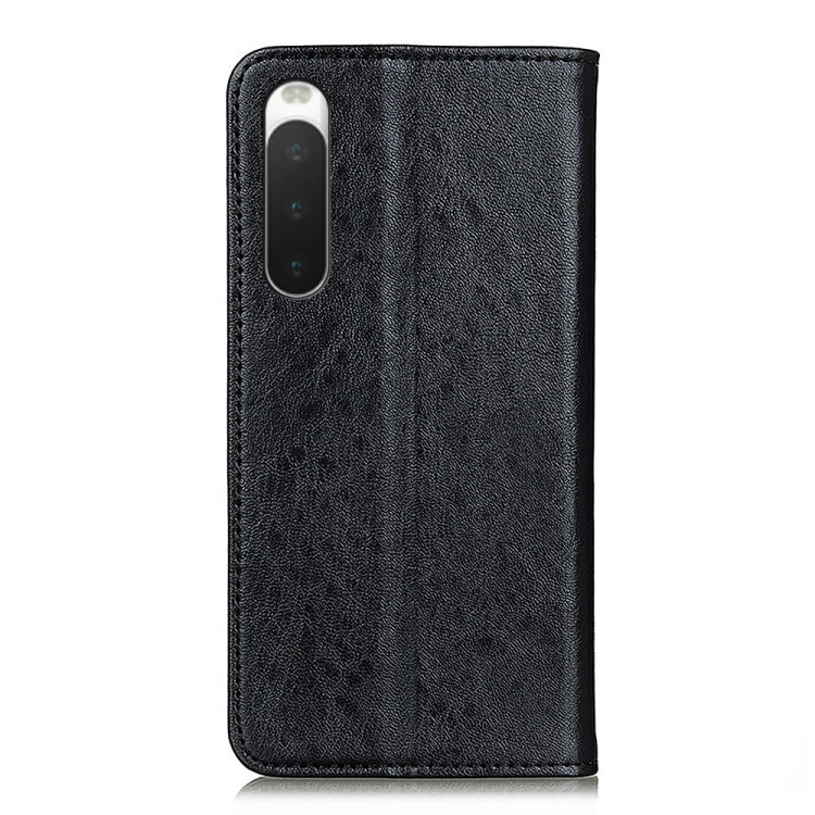 Black textured leather phone case with camera cutout and snug side fit