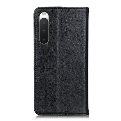 Black textured leather phone case with camera cutout and snug side fit