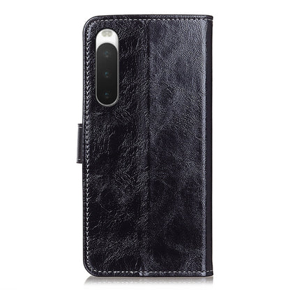 Black leather flip phone case with cutout for rear camera and speaker