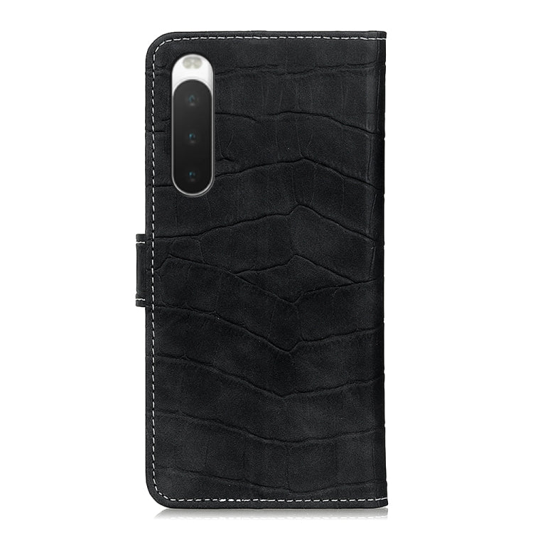 Black crocodile-texture leather phone case with camera cutout and textured finish