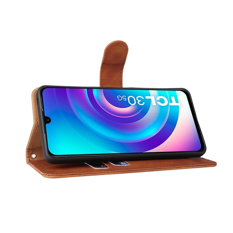 Brown leather magnetic flip phone case in stand mode with phone screen visible.