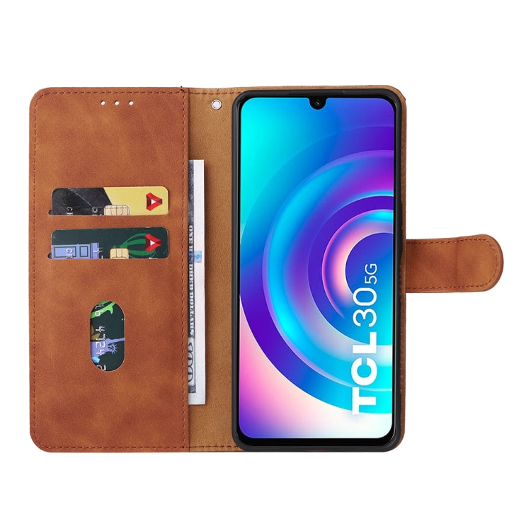 Brown leather flip phone case with internal card holder slots and phone access cutouts.
