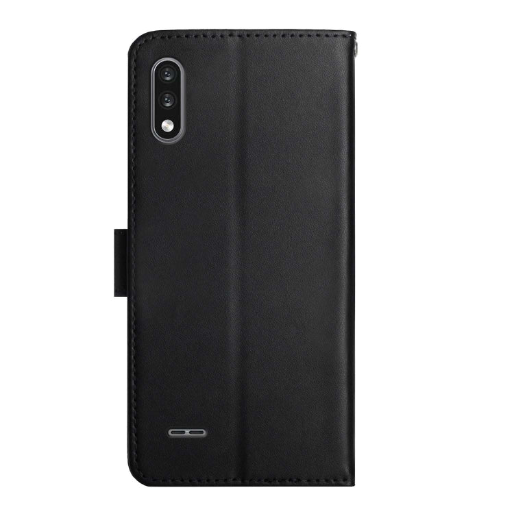 Black leather flip phone case with camera cutout on back