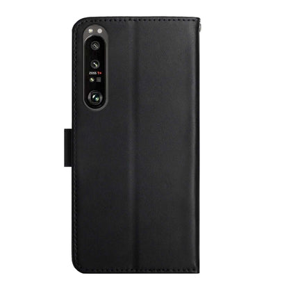 Black leather flip phone case with phone back exposed through camera opening