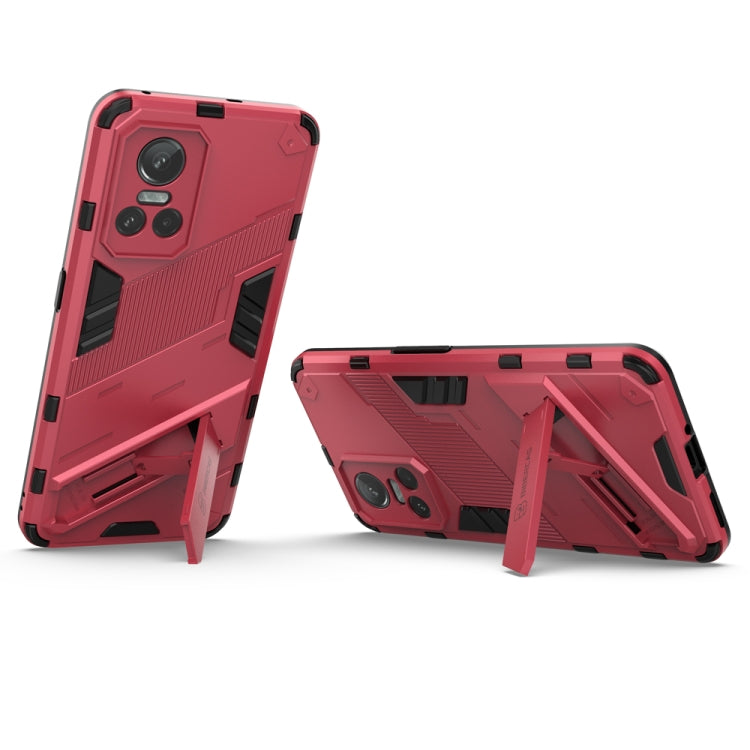 Light red rugged phone case with kickstand arms and dual camera cutouts