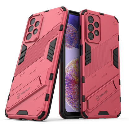 Pink rugged TPU phone case with raised corners and camera lens cutouts
