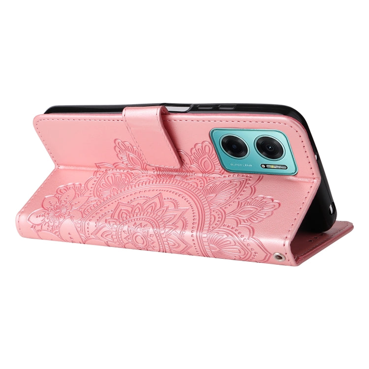 Rose pink leather wallet phone case with embossed seven-petal floral pattern and flip stand