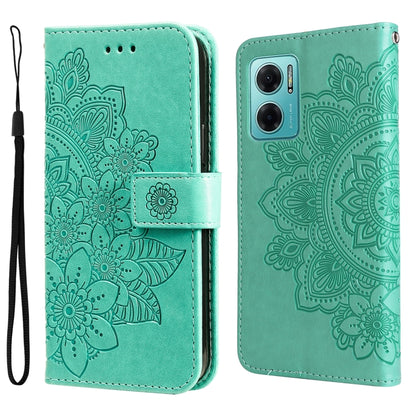 Mint green leather wallet phone case with embossed seven-petal floral pattern and wrist strap