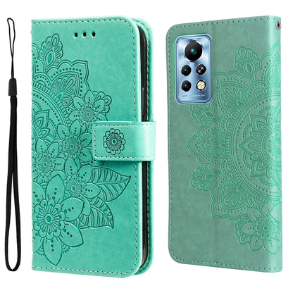 Mint green folio phone case with embossed floral mandala pattern, magnetic strap, wrist lanyard.
