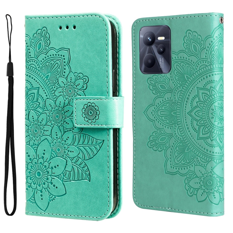 Teal embossed floral phone wallet case with strap and magnetic flap.