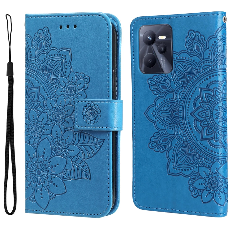 Blue embossed floral phone wallet case with strap and magnetic flap.
