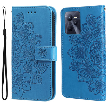 Blue embossed floral phone wallet case with strap and magnetic flap.