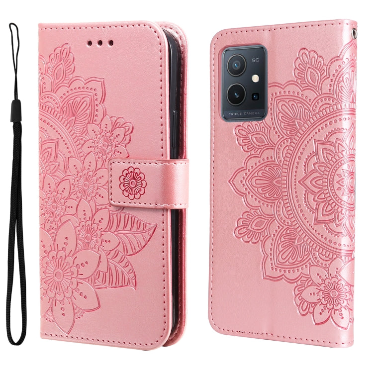Pink folio leather phone case with floral mandala embossing, camera cutout, wrist strap.