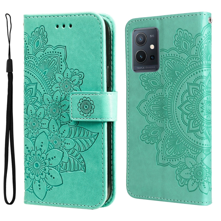 Green folio leather phone case with floral mandala embossing, camera cutout, wrist strap.