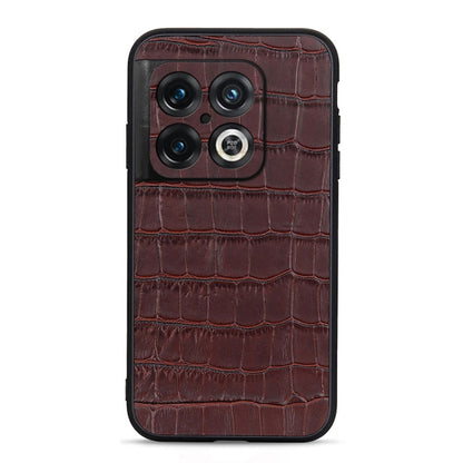 Brown crocodile-texture genuine leather phone case with triple camera cutout and circular flash.