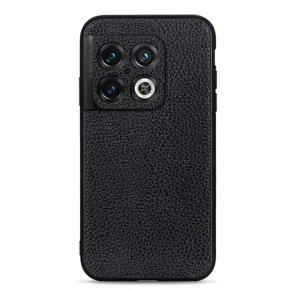 Black genuine leather phone case with textured litchi pattern and camera cutouts