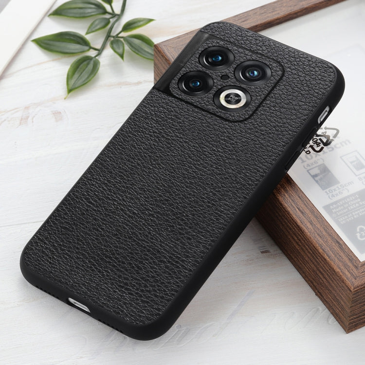 Black textured genuine leather phone case with camera cutouts and side buttons