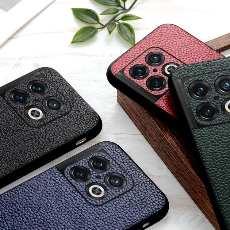 Assorted genuine leather phone cases: black, red, blue, and green with textured finish