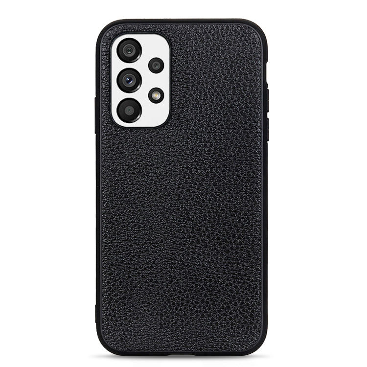 Black genuine leather phone case with litchi textured finish and camera cutout detail