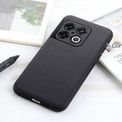 Black leather phone case with textured finish, camera cutouts, and bottom port openings.
